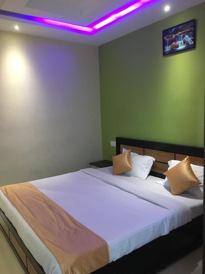Hotel Time Palace Ooty Rom bilde